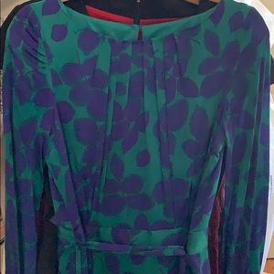 . %100 silk. Beautiful color and texture.